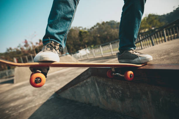 istock Skateboarder skateboarding on skate park 1334564731