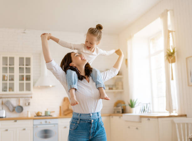 Happy loving family Mom and her daughter child girl are playing. Family holiday and togetherness. daughter stock pictures, royalty-free photos & images