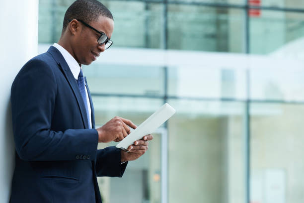 istock Marketing Manager Reading News Online 1334570695