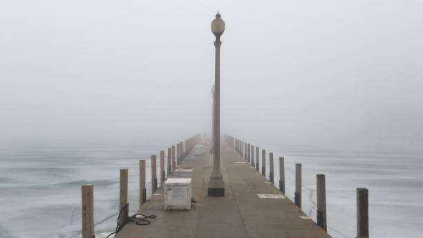 istock Pier disappearing the fog 1334570715