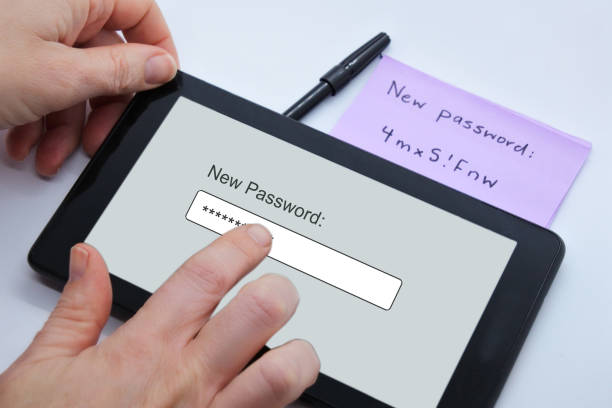 istock Person changing new password on a tablet portable device 1334570723