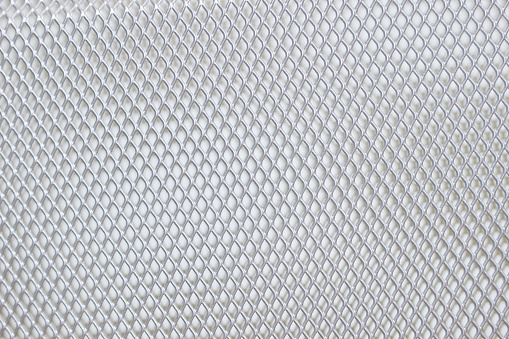 Floor mat on an industrial diamond shape metal background
