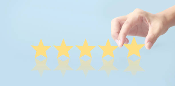 istock Rise on increasing five stars in human hand, Increase rating evaluation 1334573145