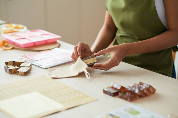 istock Woman Putting Soap Bar in Cotton Bag 1334574844