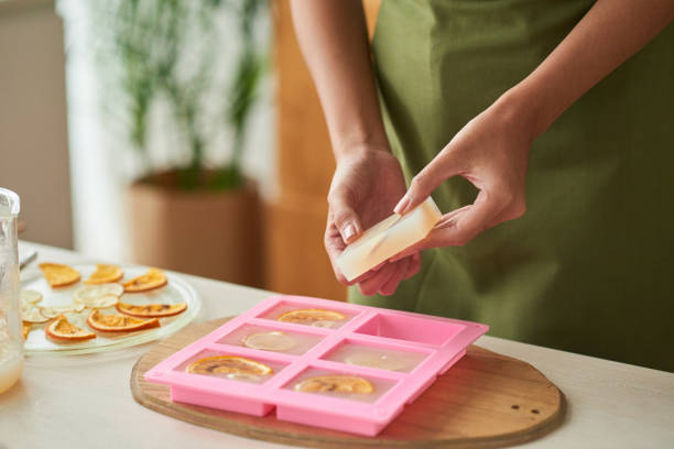 istock Hands of Woman Making Soap 1334574855