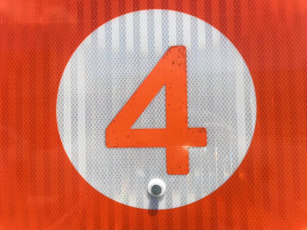 Close up number one from shiny outdoor metal sign