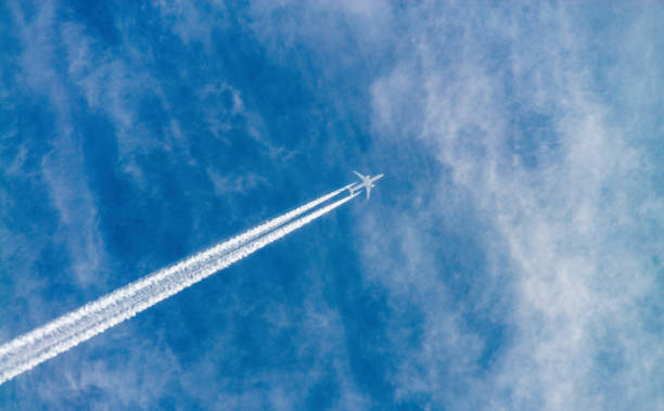 istock Airplane in the sky 1334585768
