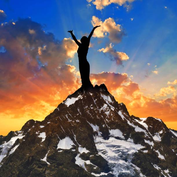 istock people stay on a mountain top 1334587878