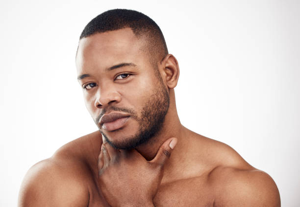 istock Studio portrait of a handsome young man posing against a white background 1334587996