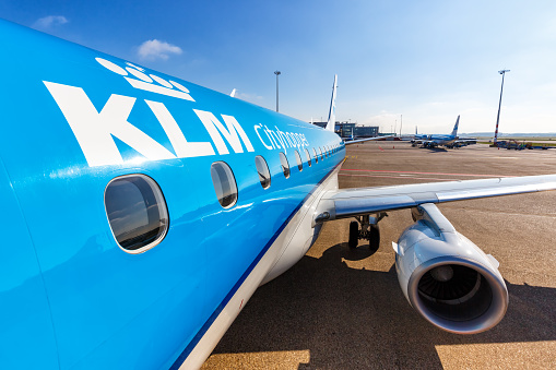 Amsterdam, Netherlands - May 29, 2021: KLM cityhopper Embraer 175 airplane at Amsterdam Schiphol airport (AMS) in the Netherlands.