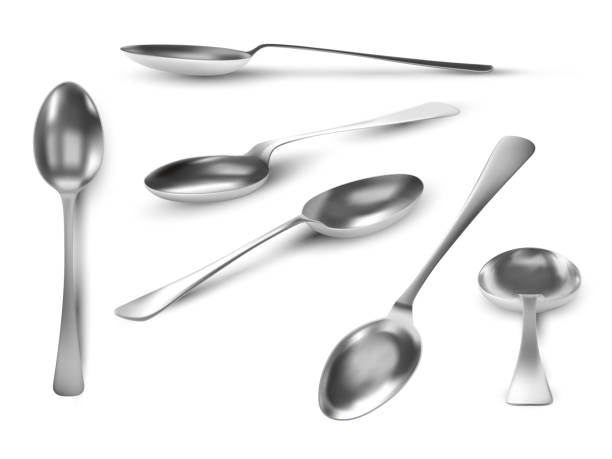 istock Realistic spoon views. 3D metal table utensil. Steel teaspoon top, angles and side view. Silver spoons for coffee, tea or dessert vector set 1334591799