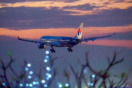 Ho Chi Minh city, December 29th 2020: Airbus A330 of Malaysia Airlines was arriving at Tan Son Nhat international airport at sunset.