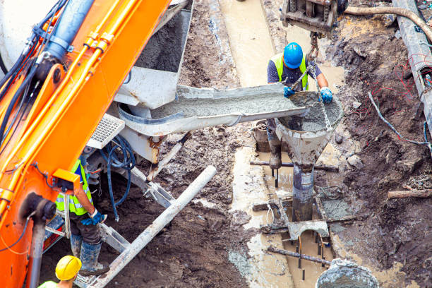 istock Pouring the building foundations with concrete 1334595854