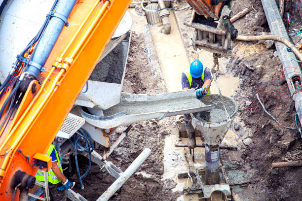 istock Pouring the building foundations with concrete 1334595860