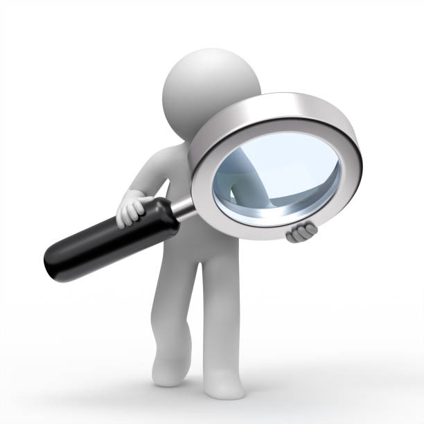 istock 3d man searching with a magnifying glass. 1334596796