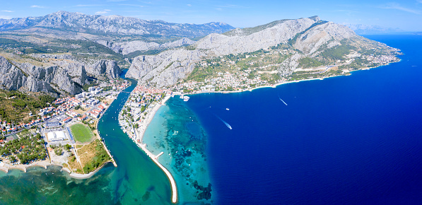 Panoramic aerial view of the old Croatian town of Omis and the river Cetina, which flows into the Adriatic Sea