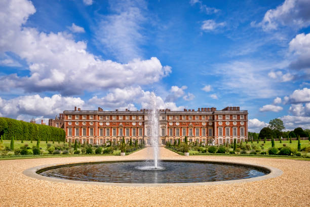 Windsor Castle and Fountain, UK 9 June 2019: Richmond upon Thames, London, UK -  The South Front and Privy Garden of Hampton Court Palace, the former royal residence in West London. hampton court stock pictures, royalty-free photos & images