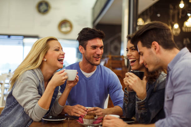 istock Four friends chatting over coffee at the bar 1334609004