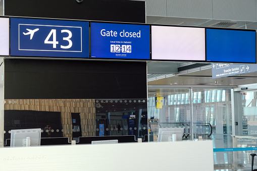 Helsinki, Finland - 08 13 2021: Helsinki Vantaa Airport gate closed empty terminal during covid-19, Finland