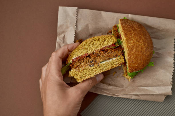istock Vegan ceviche burger with vegetables on the paper bag 1334609794