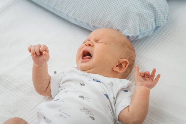 istock Newborn baby boy crying 1334611023