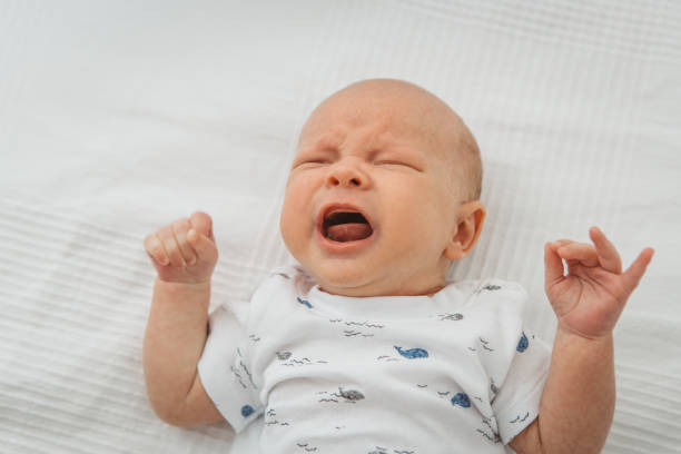 istock Newborn baby boy crying 1334611049