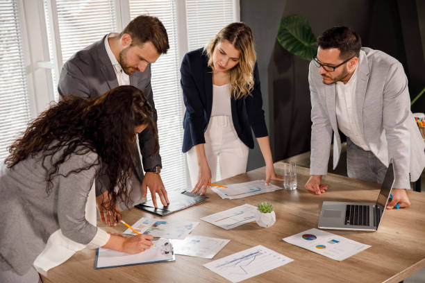 istock Reviewing project documents and brainstorming strategies 1334613019
