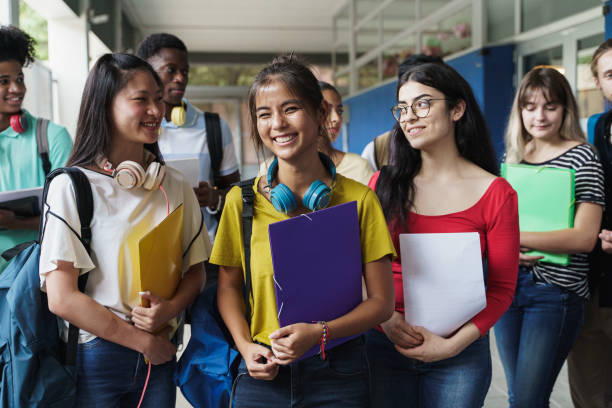Group of Happy multiracial teenager Secondary School Student Friends. Ethnic Diversity in Education and Society Group of Happy multiracial teenager Secondary School Student Friends. Ethnic Diversity in Education and Society high school student stock pictures, royalty-free photos & images