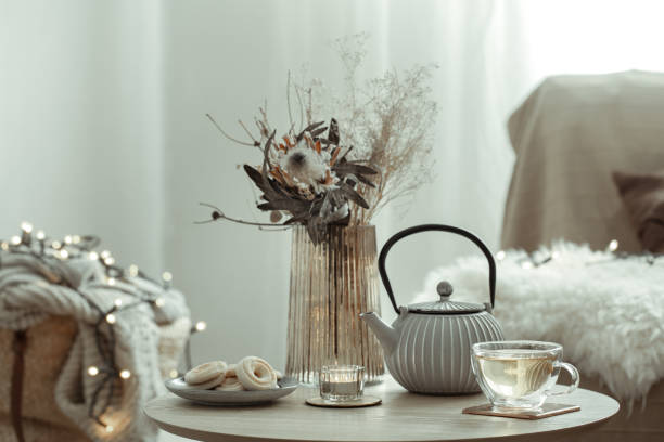 istock Home composition with tea and cookies in a cozy room interior. 1334626447