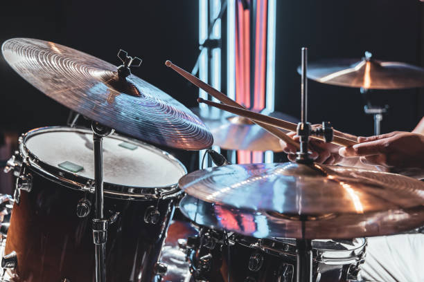 istock Close up the drummer plays drums with drum sticks. 1334628509