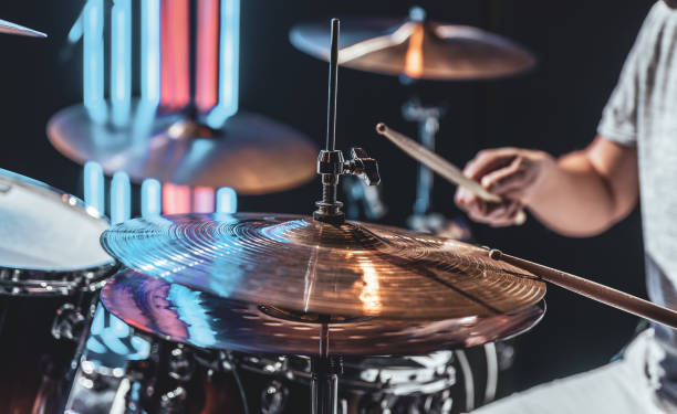 istock A male drummer plays drums with special drum sticks. 1334628510