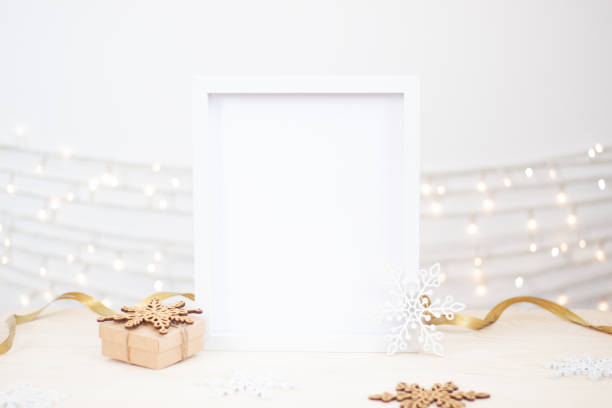 istock Zero waste Christmas natural decoration with white mock up frame on table. Close up, copy space 1334629726