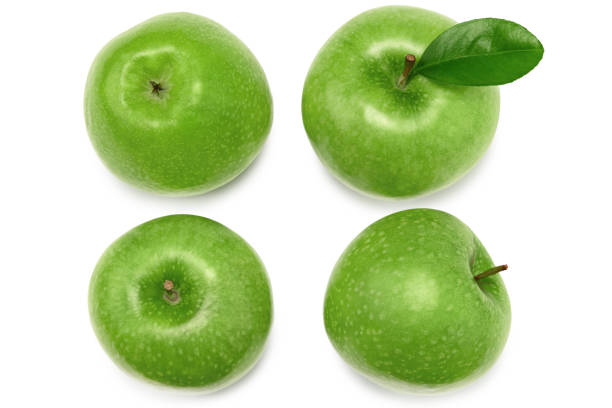 istock green apples with green leaf isolated on a white background. clipping path. top view 1334629900