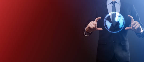 istock Businessman with protective gesture standing posture hand holding Earth icon , digital globe 1334629970