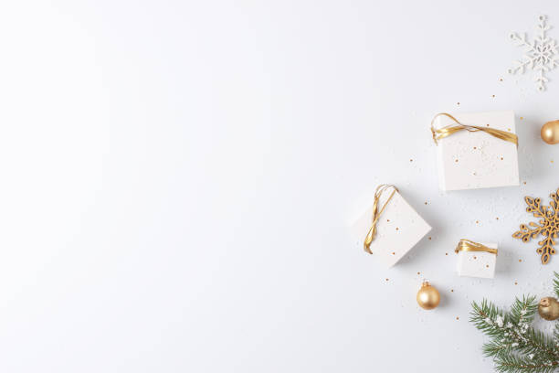 istock Christmas decorations with gifts on white background. Flat lay, copy space 1334631032