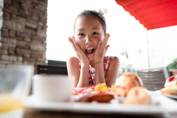 Girl eating at a restaurant