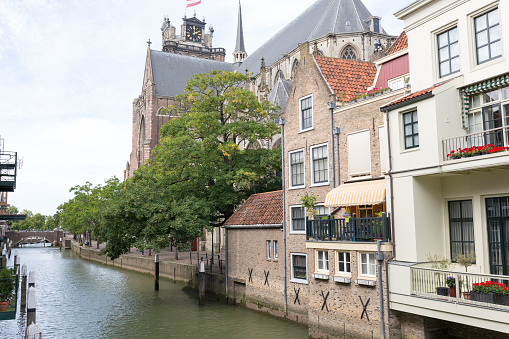 Dordrecht, The Netherlands, August 2021: View of the historic center of Dordrecht with shopping streets, canals and city hall