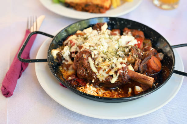 istock Braised lamb in gravy served with vegetables at the restaurant 1334642386