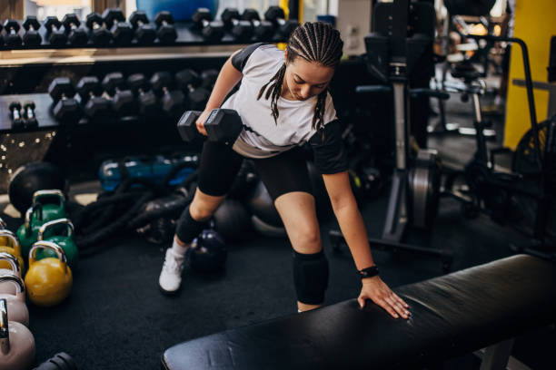 istock Young woman training in gym 1334642866