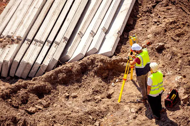 Photo of Surveyors working at new construction site