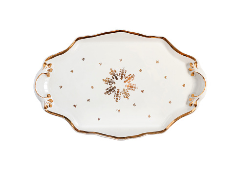 Vintage porcelain Christmas tray with decor isolated on white background with clipping path. Flat lay, top view.