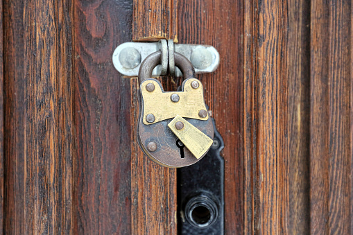 An old padlock on a wooden door, Kotor, Montenegro