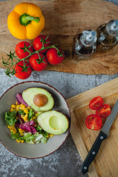 istock Healthy food. Avocado, cherry tomatoes, bell peppers, corn. 1334650772