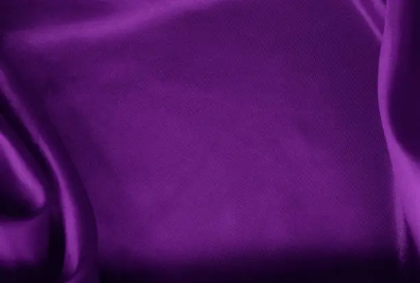 Photo of Purple fabric cloth texture for background and design art work, beautiful crumpled pattern of silk or linen.