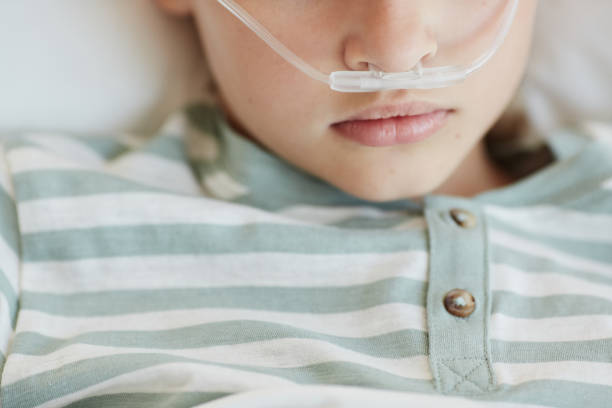 istock Child in Hospital Bed 1334653962