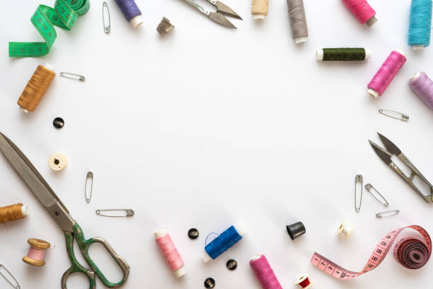 istock Flat lay composition with scissors and other sewing accessories on white background. Space for text 1334653985