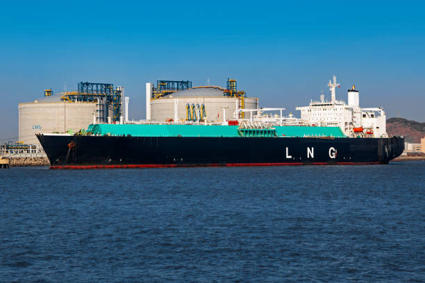 LNG ship moored at LNG terminal stock photo