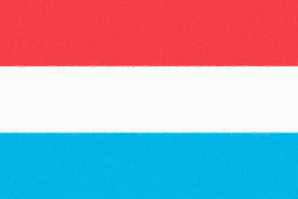 istock Luxembourg flag painted with paint on a concrete wall 1334657192