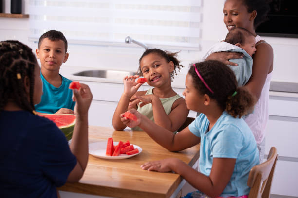 istock Enjoying to eat watermelon. 1334658395