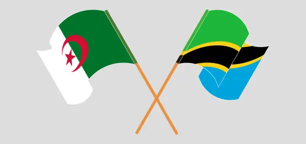 Vector illustration of Crossed and waving flags of Algeria and Tanzania
